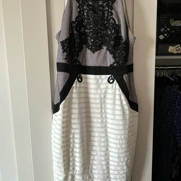 Like New - Worn Only Once or Twice. Beautiful white dress adorned w/ black lace - Picture 1 of 3